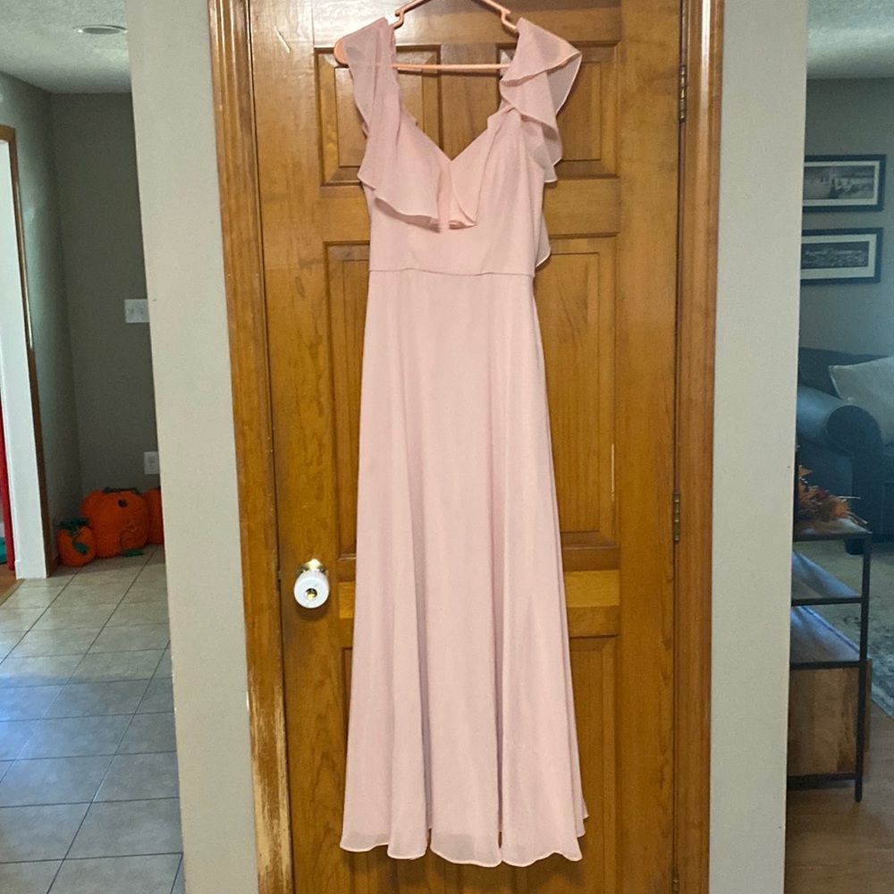Blush pink bridesmaid dress with straps and decorative shoulder straps